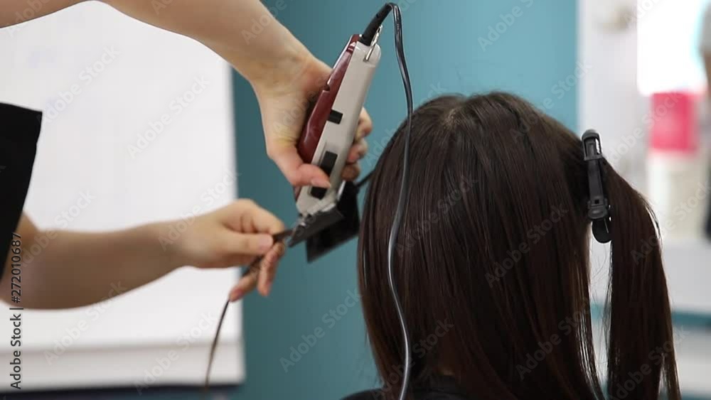 Hairdresser salon Restoration of hair structure, clipping damaged tips. Hairdresser salon Restoration of hair structure, clipping damaged tips.