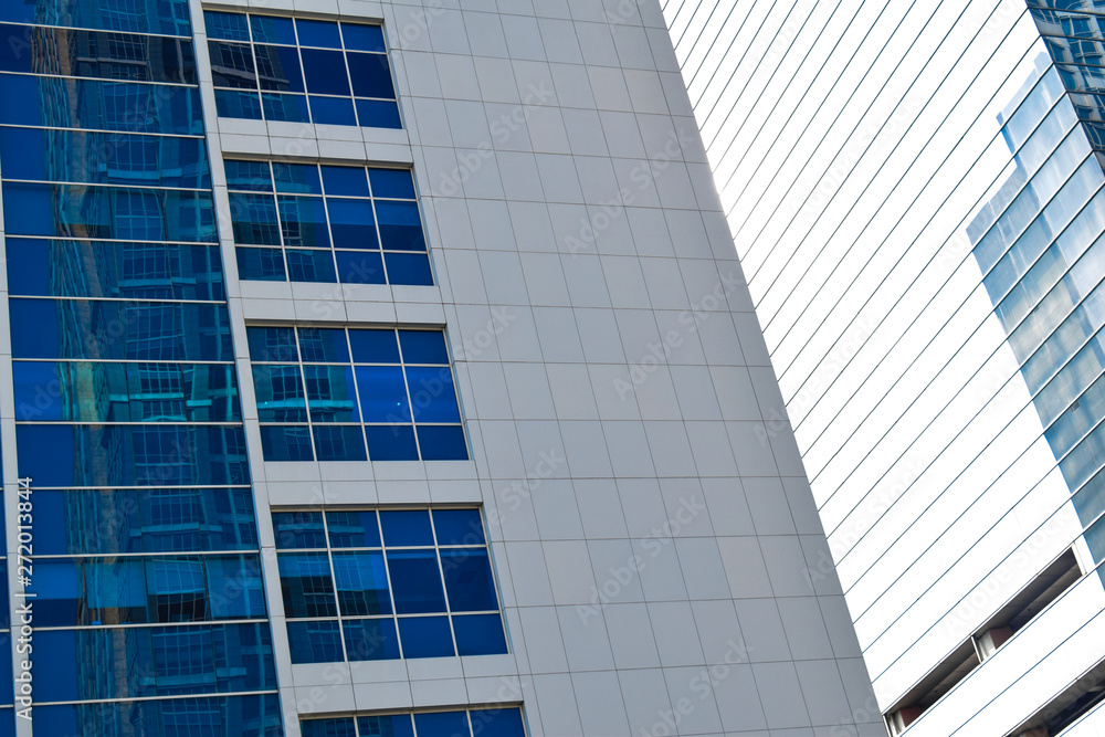 modern glass and steel office buildings low angle view at Jakarta, Indonesia modern glass and steel office buildings low angle view at Jakarta, Indonesia