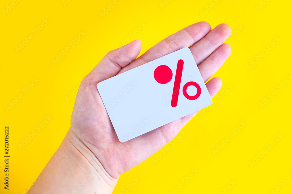 Discount card on yellow background Discount card on yellow background