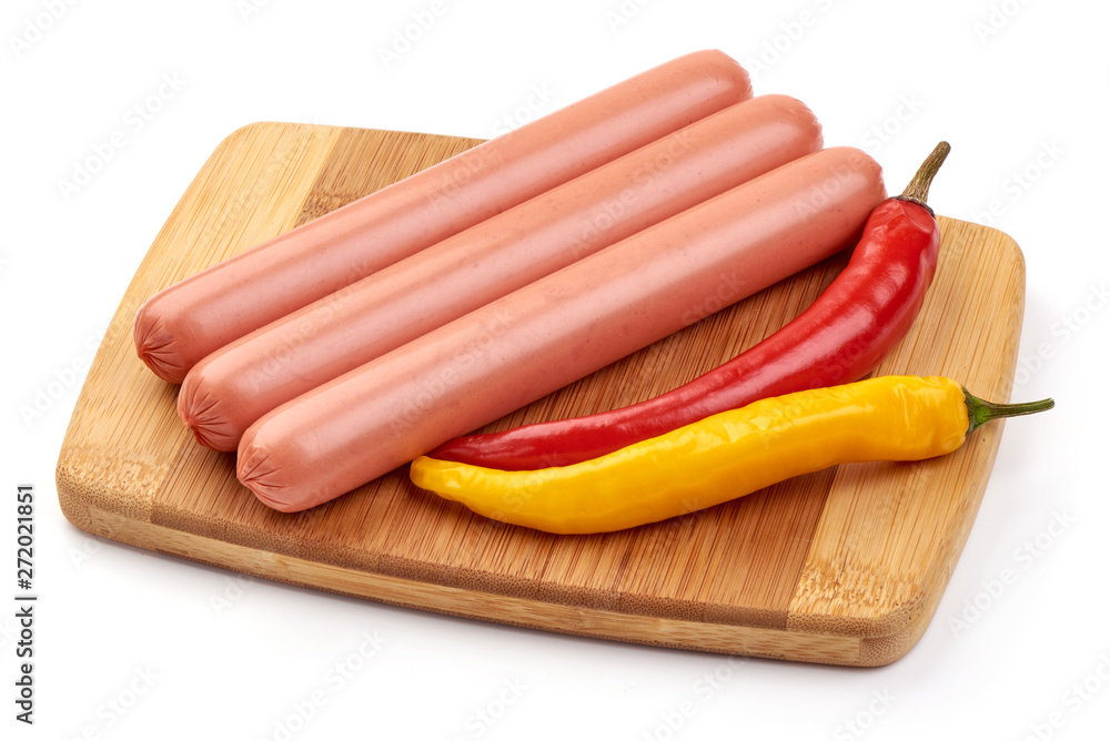 Fresh boiled pork sausages on a cutting board, close-up, isolated on white background Fresh boiled pork sausages on a cutting board, close-up, isolated on white background