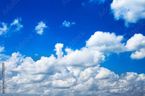 summer blue sky background with white clouds