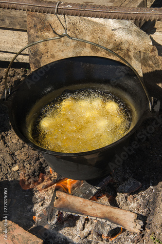 Fried potatoes in oil,ceaun in Romania