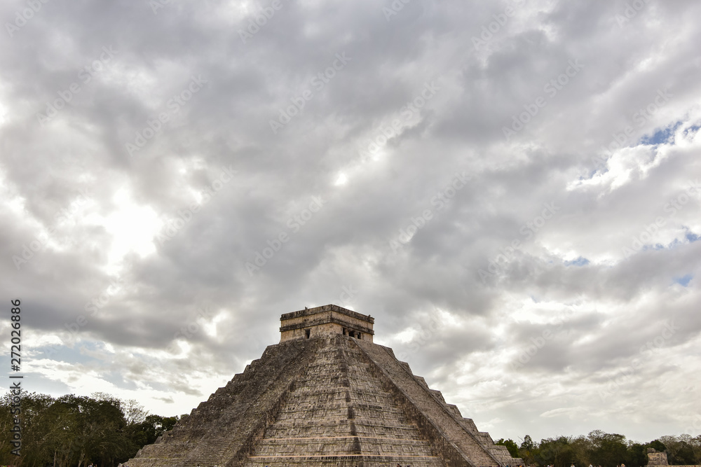 Temple of Kukulkan - a Mesoamerican step-pyramid that is the main tourist attraction at the Chichen Itza archaeological site in Yucatan, Mexico.