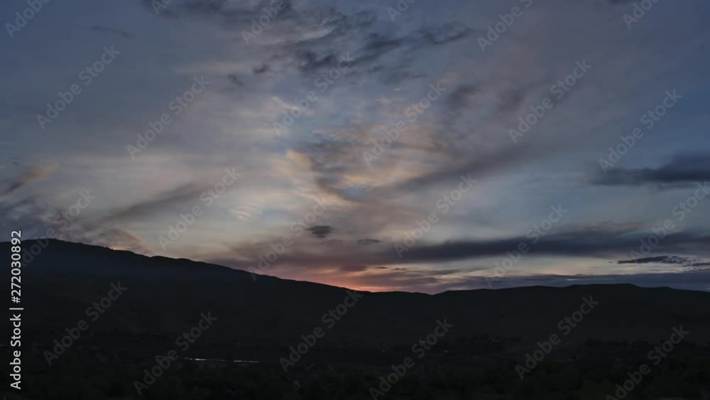 Orange and pink sunrise time lapse with plane flying through Orange and pink sunrise time lapse with plane flying through