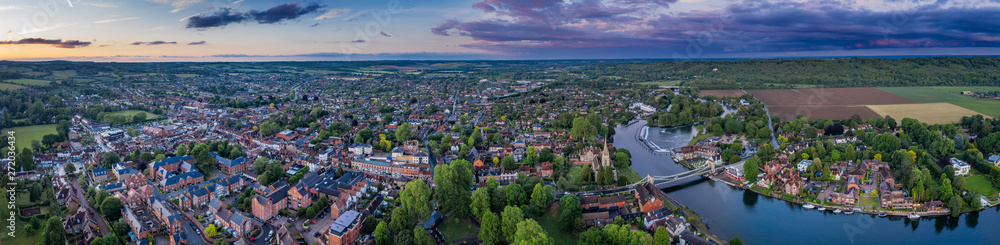 Dramatic aerial panoramic view of the beautiful town of Marlow in Buckinghamshire UK, captured after a rain storm at dusk - obrazy, fototapety, plakaty 