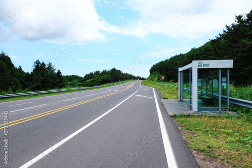 Bus stop. Road in Jeju Island, South Korea.