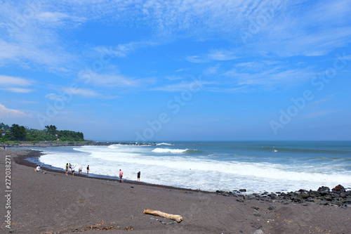 Black Sand Beach is a famous tourist attraction in Jeju Island.