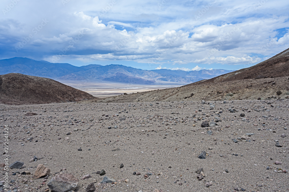 Death Valley, California / USA - May 25, 2019: Landscape in Death Valley on Artist Drive with beautiful colors, clouds moving on day time. 