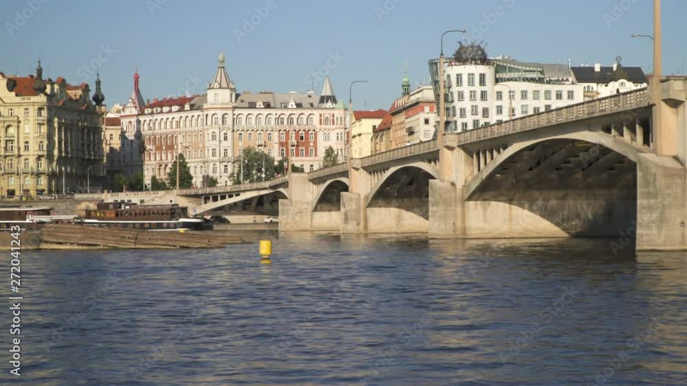 View to the Prague street building From floating Tourist Boat At Vltava River View to the Prague street building From floating Tourist Boat At Vltava River