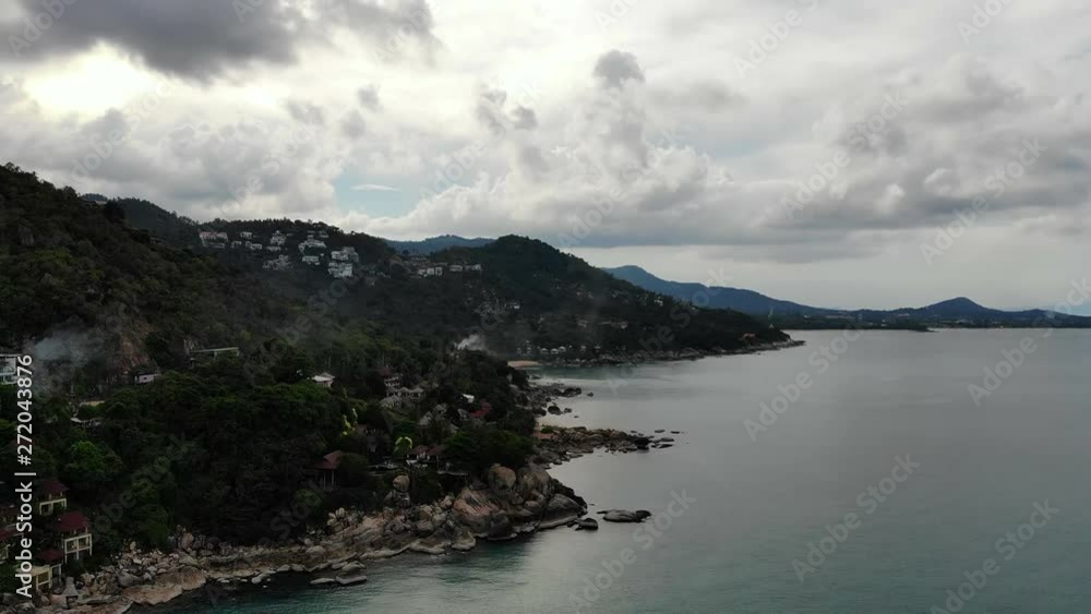 Aerial view of tropical sea and beach on white cloud and blue sky Aerial view of tropical sea and beach on white cloud and blue sky