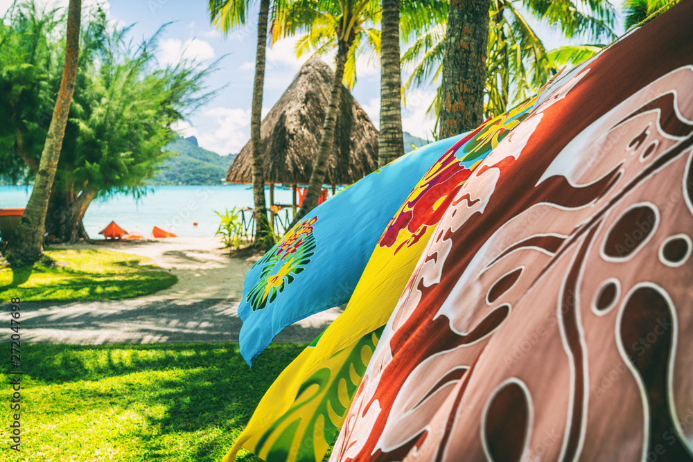 Tahiti vacation background saron pareo tahitian skirts flowing in the wind  at beach resort souvenir shop of hotel. Sarong wrap skirt, Tahiti, French  Polynesia. Handmade tourism souvenir. Stock Photo | Adobe Stock