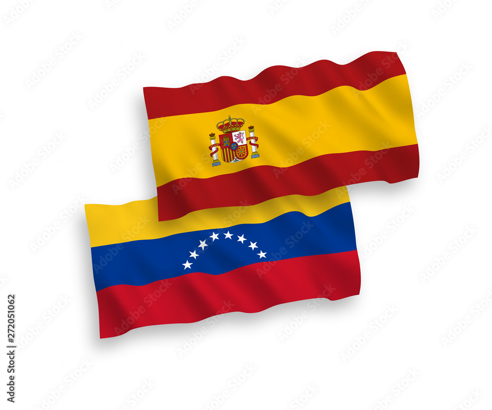 National vector fabric wave flags of Venezuela and Spain isolated on white background. 1 to 2 proportion. National vector fabric wave flags of Venezuela and Spain isolated on white background. 1 to 2 proportion.