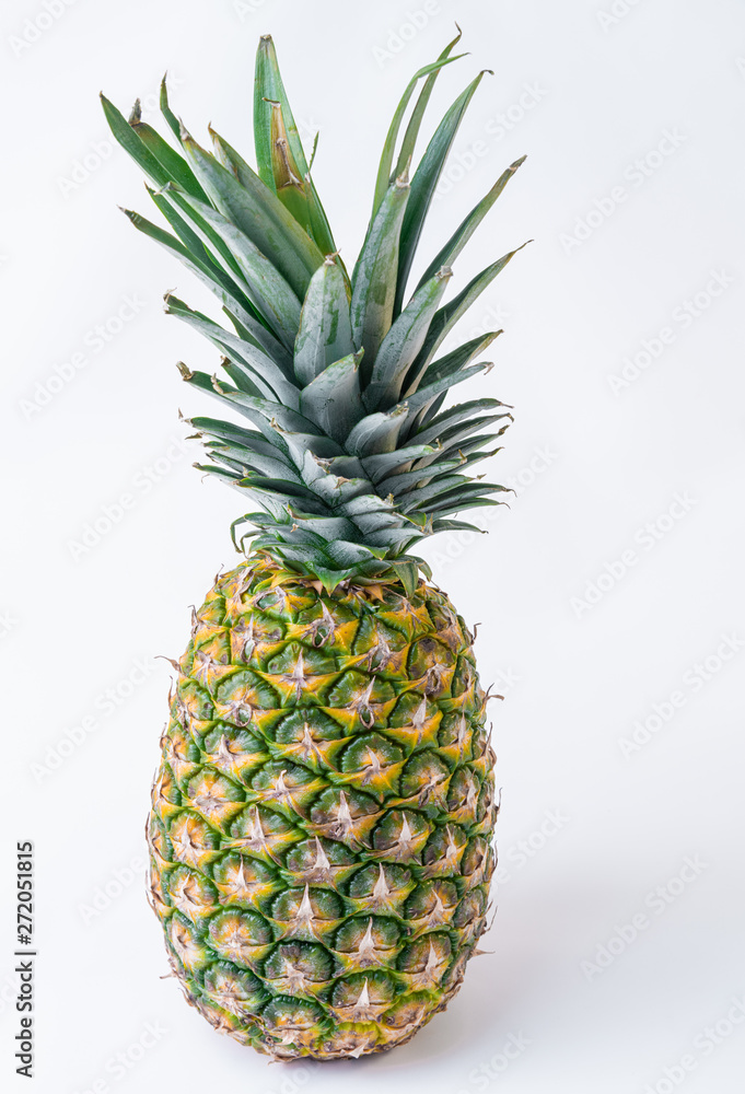 Fototapeta premium Fresh whole ripe pineapple isolated on white background