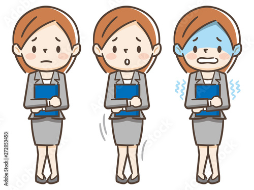 女性　スーツ　震える