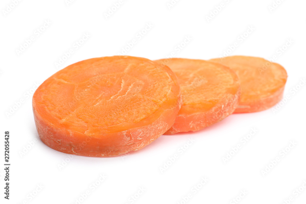Slices of fresh ripe carrot on white background Slices of fresh ripe carrot on white background