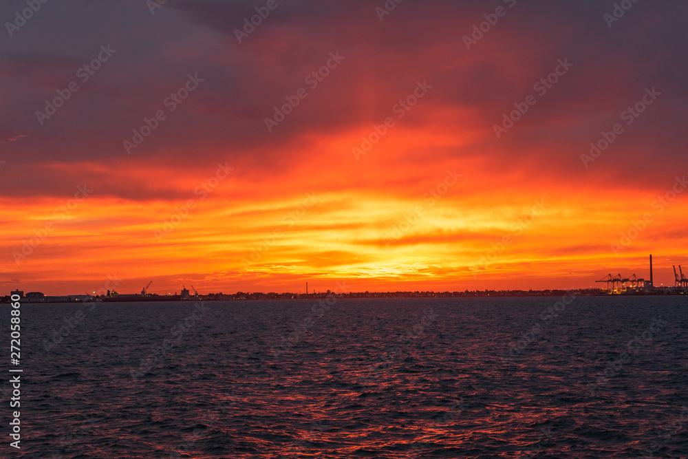 Sunset on the sea from pier in st. Kilda Melbourne