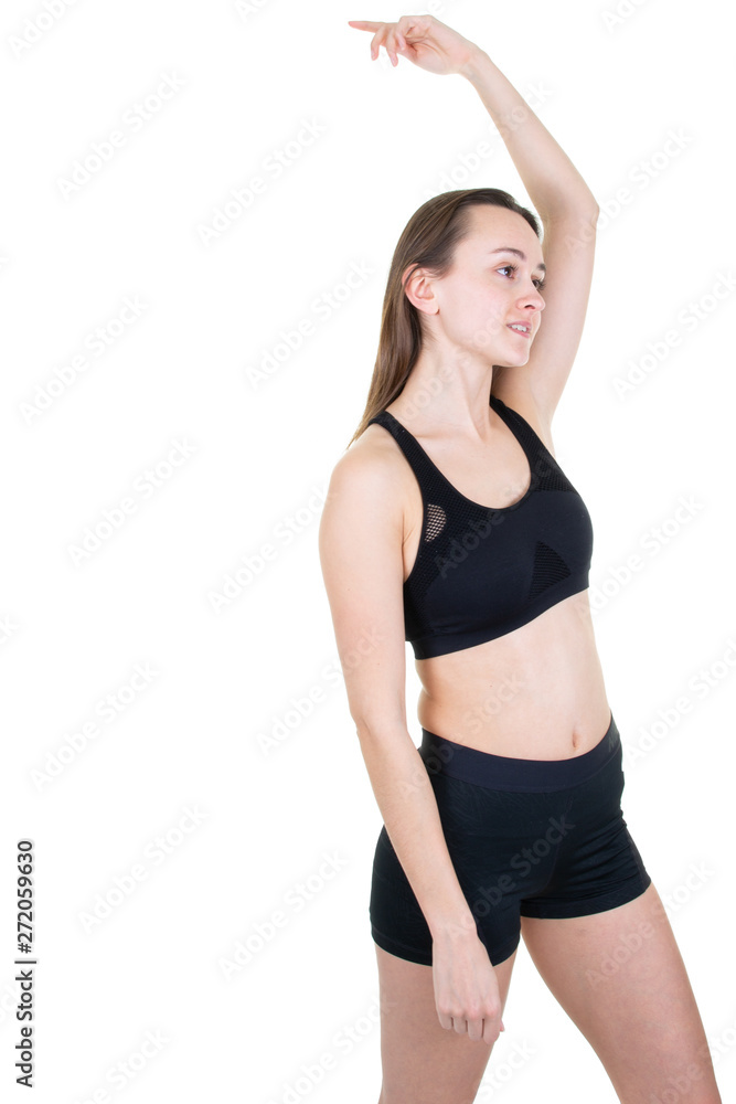 Young sporty woman stretching arm portrait isolated in white background Young sporty woman stretching arm portrait isolated in white background