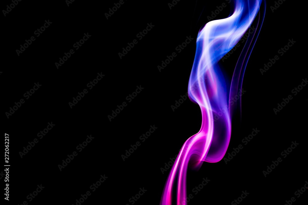 Colored smoke on black background Colored smoke on black background