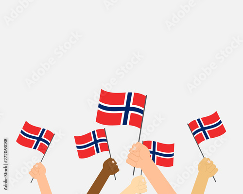 Vector illustration of hands holding Norway flags isolated on background  photo