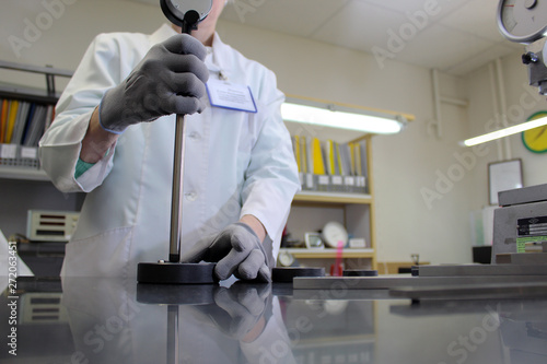 woman makes the metrological measurements