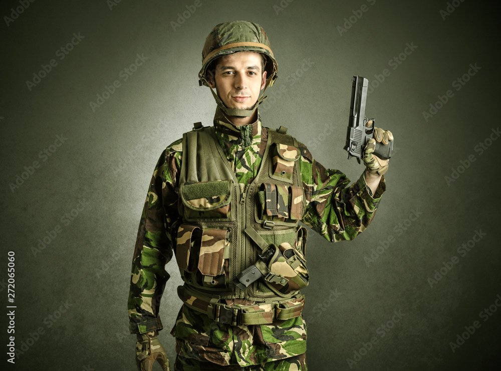 Soldier agent in a dark room with arms on his hand and gas mask Stock ...