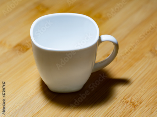 White mug on a wooden table