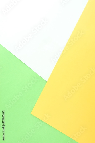 Abstract geometric paper background green yellow trend colors. Minimal fashion mock up concept. Flat lay, Top view. Copy space