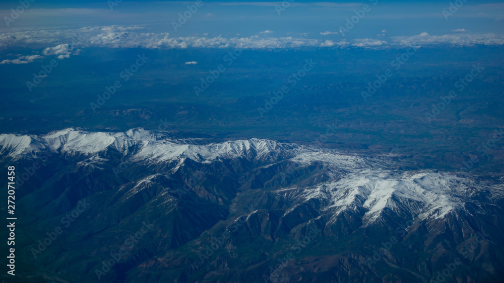 Fototapeta premium Image Of Aerial View Alps Mountains Horizon, Shot From Plane
