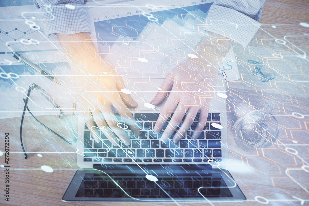 Businessman with computer background with technology theme hologram. Concept of big data. Double exposure. Businessman with computer background with technology theme hologram. Concept of big data. Double exposure.