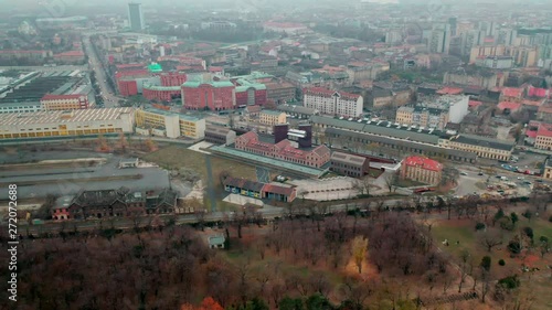 Drone footage flyingover Budapest, Hungary. there are some old abandoned buildings and train station. photo