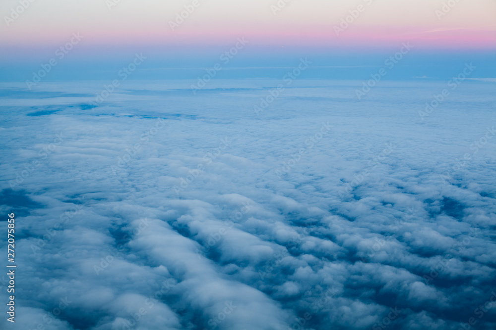 Fototapeta premium Blue sky clouds background. Beautiful landscape with clouds and red sunset