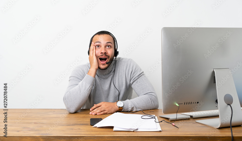 Telemarketer Colombian man with surprise and shocked facial expression Telemarketer Colombian man with surprise and shocked facial expression