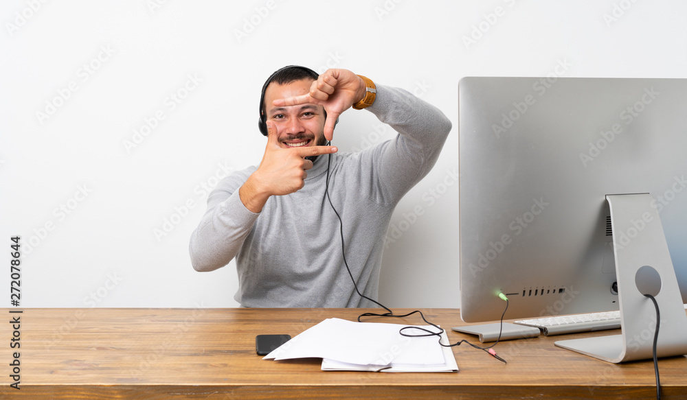 Telemarketer Colombian man focusing face. Framing symbol Telemarketer Colombian man focusing face. Framing symbol