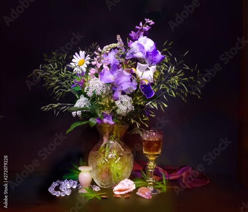 still life  flowers  a bouquet of flowers in a vase with objects