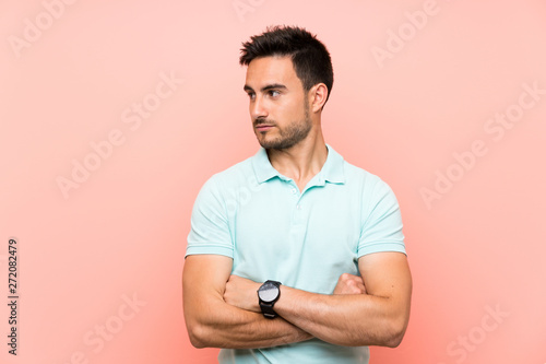 Handsome young man over isolated background portrait