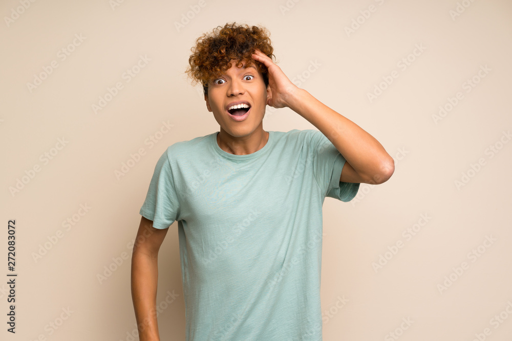 African american man with green shirt has just realized something and has intending the solution African american man with green shirt has just realized something and has intending the solution