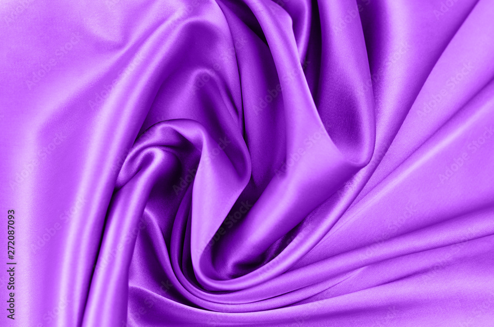 Obraz premium Background from satin fabric of violet color.