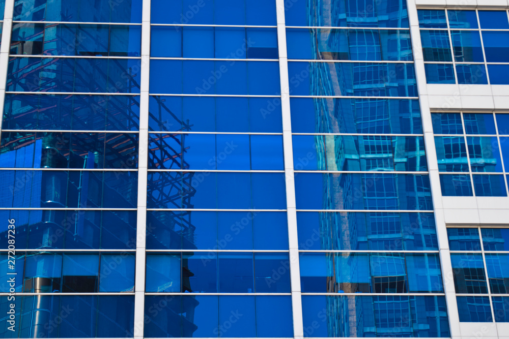 JAKARTA, INDONESIA, JUNE 8, 2019 : modern glass and steel office buildings low angle skyscraper view at Jakarta, Indonesia JAKARTA, INDONESIA, JUNE 8, 2019 : modern glass and steel office buildings low angle skyscraper view at Jakarta, Indonesia