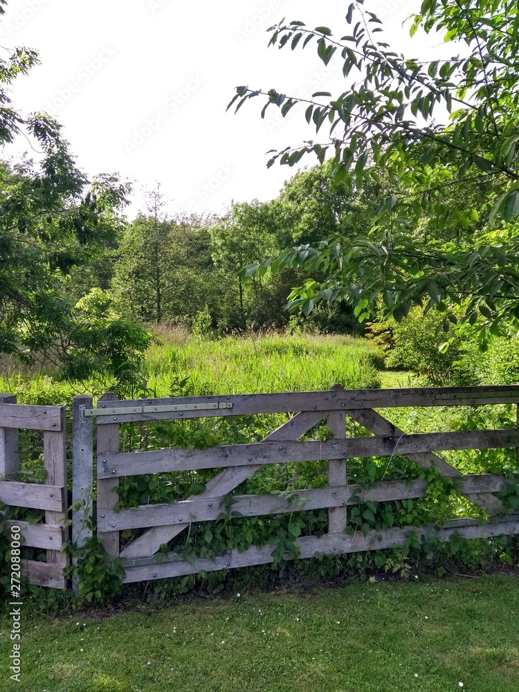 old wooden fence in a field old wooden fence in a field
