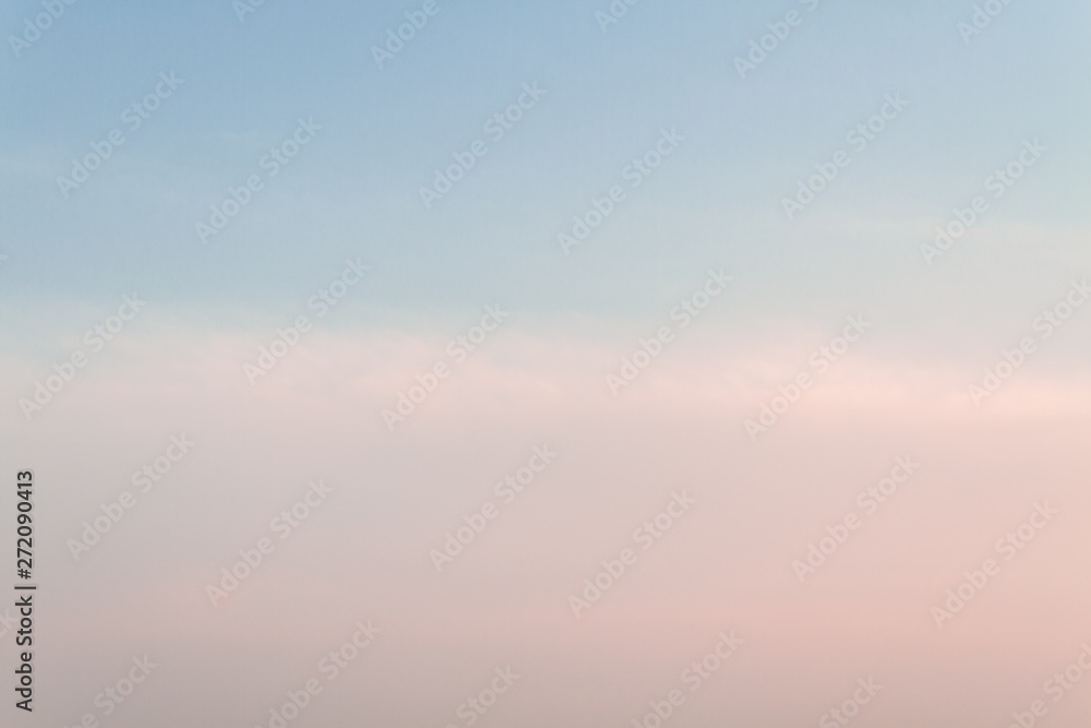 Beautiful sunset sky with feathery pink clouds in spring