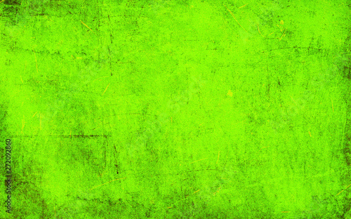 Green scraped texture. Green grungy wallpaper. Dark green desktop image. Green abstract abraded pattern. © peter