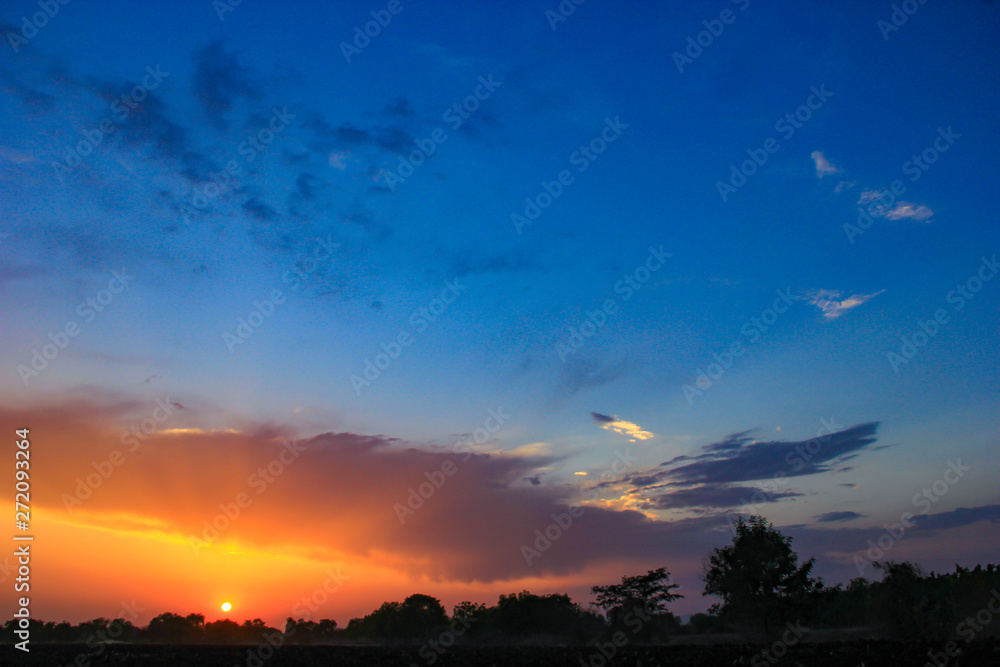 Sunset / sunrise with clouds, Panoramic view of a cloudy sky at sunset Sunset / sunrise with clouds, Panoramic view of a cloudy sky at sunset