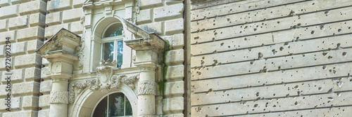 Wallpaper Mural Berlin old derelict building entrance and wall ridden with bullet holes, signs of World War Two. Torontodigital.ca