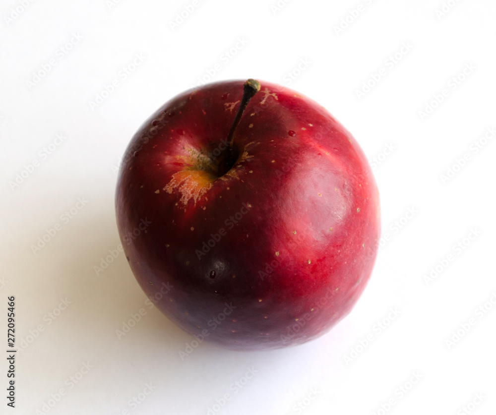 Red apple on white background, closeup
