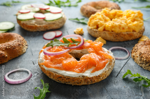 Healthy Bagels breakfast sandwich with salmon, scrambled eggs, vegetables and cream cheese