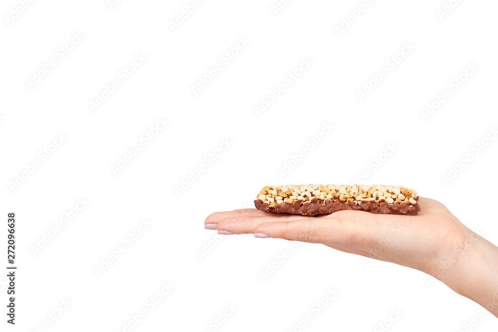 Hand with healthy granola, energy, sport, breakfast and protein bar. Hand with healthy granola, energy, sport, breakfast and protein bar.
