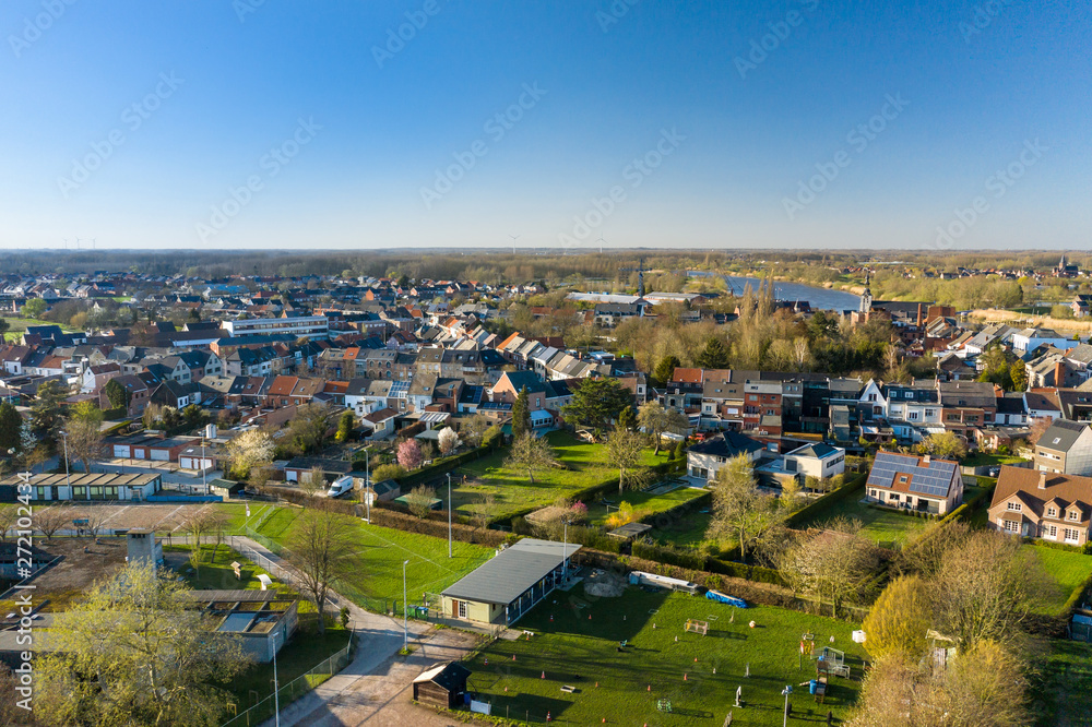 Aerial view of Baasrode, a small flemish town on the shore of the Scheldt river