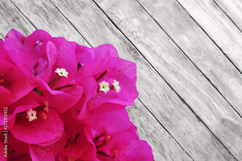 flowers on wooden background with copy space for text