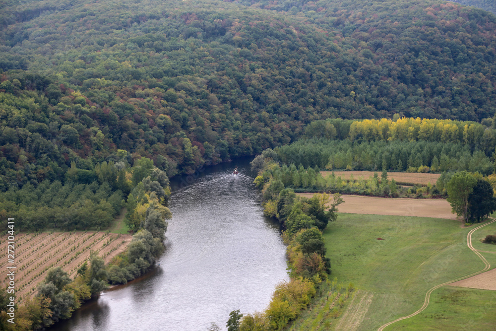 Top view of the Dordogne River, fields, forests. France