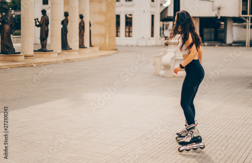 Sweet girl skating in the city
